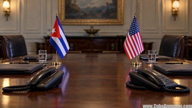 Banderas de Cuba y Estados Unidos en una mesa diplomática con teléfonos